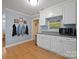 Mud Room featuring storage, hardwood floors, and access to garage at 2646 N Olivers Cross Rd, Newton, NC 28658