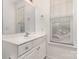 Well-lit bathroom featuring a white vanity and a window allowing natural light at 3158 Walnut Park Dr, Charlotte, NC 28262