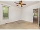 Bright bedroom with natural light, ceiling fan, neutral carpet and closet at 3158 Walnut Park Dr, Charlotte, NC 28262