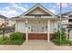 Mail kiosk with brick base and white columns provides residents with secure mailboxes at 3158 Walnut Park Dr, Charlotte, NC 28262