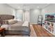 Spacious main bedroom with hardwood floors, neutral paint, and a comfortable design at 335 Greystone Rd, Charlotte, NC 28209