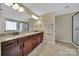 Bathroom featuring a double vanity with a granite countertop, a shower, and a bathtub at 4016 Garden Oak Dr, Indian Trail, NC 28079