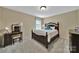 Cozy bedroom with neutral walls and carpet, a window with natural light and classic furniture at 4016 Garden Oak Dr, Indian Trail, NC 28079
