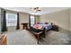 Bedroom with carpet flooring, ceiling fan, and natural light from windows at 4016 Garden Oak Dr, Indian Trail, NC 28079