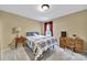 Bedroom featuring carpeted floors, a warm color scheme, and a window at 4016 Garden Oak Dr, Indian Trail, NC 28079