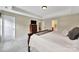 Comfortable bedroom featuring carpet, a TV, neutral walls, and a window with natural light at 4016 Garden Oak Dr, Indian Trail, NC 28079