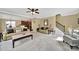 Inviting living room with a neutral color palette and comfortable seating arrangement, adjacent to the kitchen area at 4016 Garden Oak Dr, Indian Trail, NC 28079