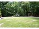 Expansive backyard featuring an outbuilding and covered storage at 432 Partridge Pl, York, SC 29745