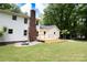 The backyard includes a wood deck, stone fire pit, and expansive lawn at 432 Partridge Pl, York, SC 29745
