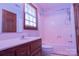 This bathroom features a single sink vanity, toilet, and shower/tub combination with a window for natural light at 432 Partridge Pl, York, SC 29745
