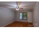 Neutral bedroom featuring hardwood floors, a ceiling fan and a window at 432 Partridge Pl, York, SC 29745