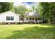 Charming home with a large front yard, white siding, and inviting front porch at 432 Partridge Pl, York, SC 29745