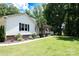 Inviting single Gathering home with a lush lawn, front porch, and decorative palm tree at 432 Partridge Pl, York, SC 29745