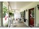 Cozy covered front porch featuring chairs and a view of the landscaped front yard at 432 Partridge Pl, York, SC 29745