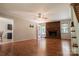 Spacious living room featuring hardwood floors and a cozy brick fireplace at 432 Partridge Pl, York, SC 29745