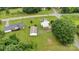 Overhead view of a home and detached garage, set on a spacious, well-manicured lot with mature trees at 543 18Th Nw St, Hickory, NC 28601