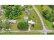 Aerial view outlining property lines of a home with solar panels, a detached garage, and a large, grassy lot at 543 18Th Nw St, Hickory, NC 28601