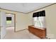 Bedroom with a dresser, window, and carpet flooring at 543 18Th Nw St, Hickory, NC 28601