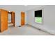 Simple bedroom with carpet, white walls, closet, and natural light at 543 18Th Nw St, Hickory, NC 28601