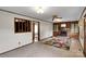 Cozy living room featuring a brick fireplace, built-in shelves, carpeted flooring and decorative ceilings at 543 18Th Nw St, Hickory, NC 28601