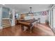 Finished basement featuring a pool table, wet bar, gas fireplace, flat screen TV and seating at 6824 N Baltusrol Ln, Charlotte, NC 28210