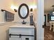 Cozy bathroom with a decorative vanity and updated fixtures, creating a serene and stylish retreat for daily routines at 8200 Lansford Rd, Charlotte, NC 28277