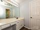 Bright bathroom with a long vanity, featuring ample storage and counter space for efficient morning and evening routines at 8200 Lansford Rd, Charlotte, NC 28277