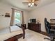 Comfortable bedroom with a desk area, creating a cozy and versatile space for both rest and productivity at 8200 Lansford Rd, Charlotte, NC 28277
