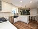 Bright kitchen with subway tile backsplash, and stainless steel appliances at 8200 Lansford Rd, Charlotte, NC 28277