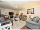 Comfortable living room featuring hardwood floors and neutral furnishings at 8200 Lansford Rd, Charlotte, NC 28277