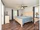 Inviting main bedroom with natural light, offering a spacious and serene retreat for relaxation and restful nights at 8200 Lansford Rd, Charlotte, NC 28277