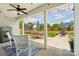 Covered patio overlooking a fenced backyard with patio furniture, a fire pit, and a trampoline at 959 Robinson Rd, Gastonia, NC 28056