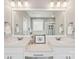 Bathroom featuring a double vanity, framed mirror, and vanity space at 959 Robinson Rd, Gastonia, NC 28056
