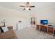 Bright home office featuring neutral walls, carpet, ceiling fan, and a work space with a computer at 959 Robinson Rd, Gastonia, NC 28056