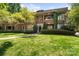Beautiful brick building with manicured lawn and lush landscaping at 1025 Ardsley Rd # 103, Charlotte, NC 28207