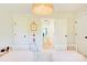 Shared bedroom with twin beds, soft carpet, and charming wall decorations at 1030 Little Cowgirl Ln, Cleveland, NC 27013