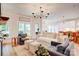 Bright and inviting living room featuring hardwood floors, neutral tones, and stylish decor at 1030 Little Cowgirl Ln, Cleveland, NC 27013