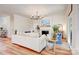 Cozy living room with a fireplace, plush seating, and abundant natural light at 1030 Little Cowgirl Ln, Cleveland, NC 27013