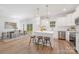 Bright kitchen featuring an island with barstool seating and stainless steel appliances at 1148 Thayer Glen Ct, Charlotte, NC 28213