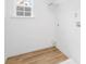 Practical laundry room with ample natural light and space for appliances at 1148 Thayer Glen Ct, Charlotte, NC 28213