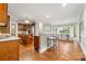 Open-concept kitchen with stainless steel appliances and seamless integration into the dining area at 1200 Churchill Downs Dr, Waxhaw, NC 28173