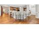 Kitchen featuring a breakfast bar with seating and wooden cabinets at 1200 Churchill Downs Dr, Waxhaw, NC 28173