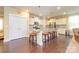 Spacious kitchen with a large island, stainless steel appliances, and hardwood floors at 121 Martingale Ave, Mooresville, NC 28115