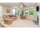Comfortable living room featuring lots of natural light, and a fireplace feature at 121 Martingale Ave, Mooresville, NC 28115