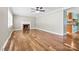 Spacious living room with hardwood floors, fireplace, and access to the kitchen at 137 Deal Ln, Statesville, NC 28677