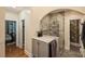 Elegant bathroom with a walk-in shower, stylish tile work, and modern fixtures at 16430 New Providence Ln, Charlotte, NC 28277