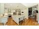 Open kitchen with stainless steel appliances and hardwood floors at 16430 New Providence Ln, Charlotte, NC 28277