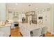 Bright kitchen with an island and modern appliances at 16430 New Providence Ln, Charlotte, NC 28277