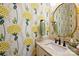 Stylish powder room with unique floral wallpaper and a modern vanity at 16430 New Providence Ln, Charlotte, NC 28277