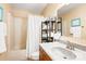 Bathroom with wood vanity and framed mirror, shower and bathtub at 1666 Sam Smith Rd, Fort Mill, SC 29708